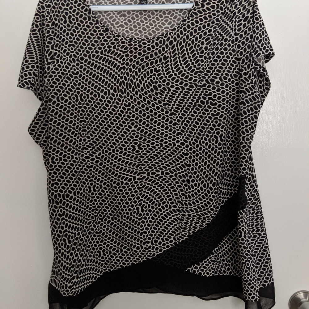 Blouse with crepe accents